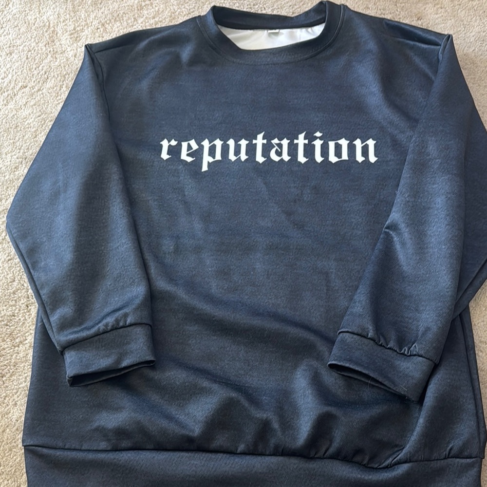 Women's black Taylor Swift "Reputation" sweatshirt